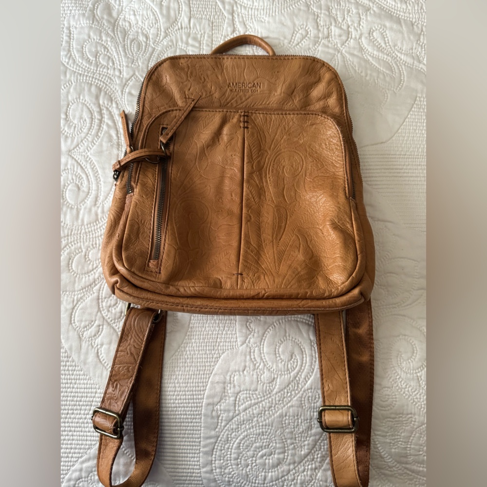 American Leather Co embossed leather backpack